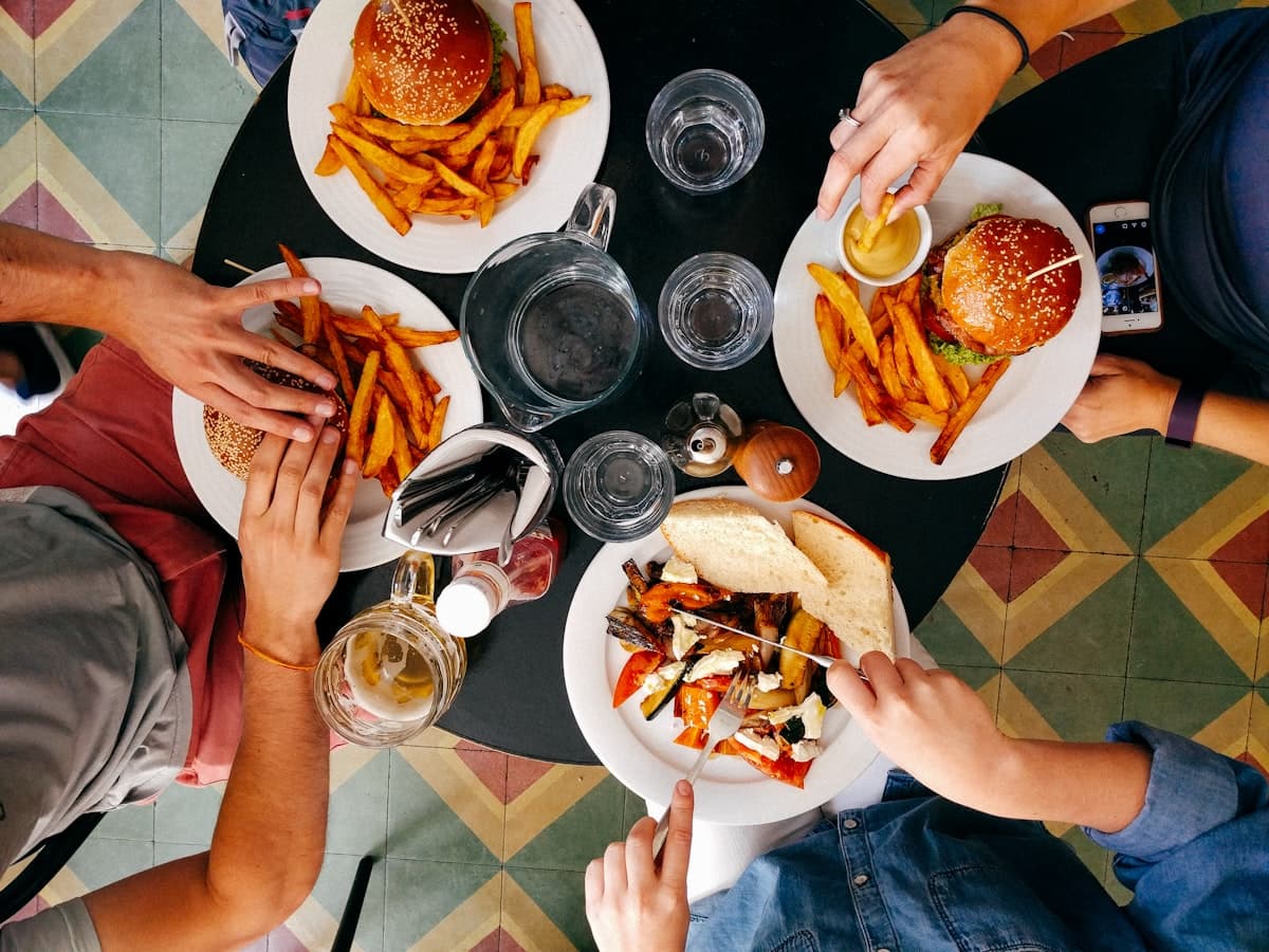 Warm restaurant interior with diners